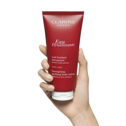 EAU DYNAMISANTE ENERGIZING MELTING BODY LOTION - FRAGRANCED + MOISTURIZING BODY LOTION by CLARINS at Sundora